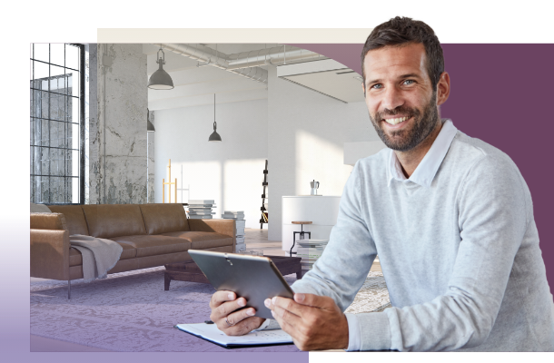 Mann mit Tablet in der Hand in modernem Loft